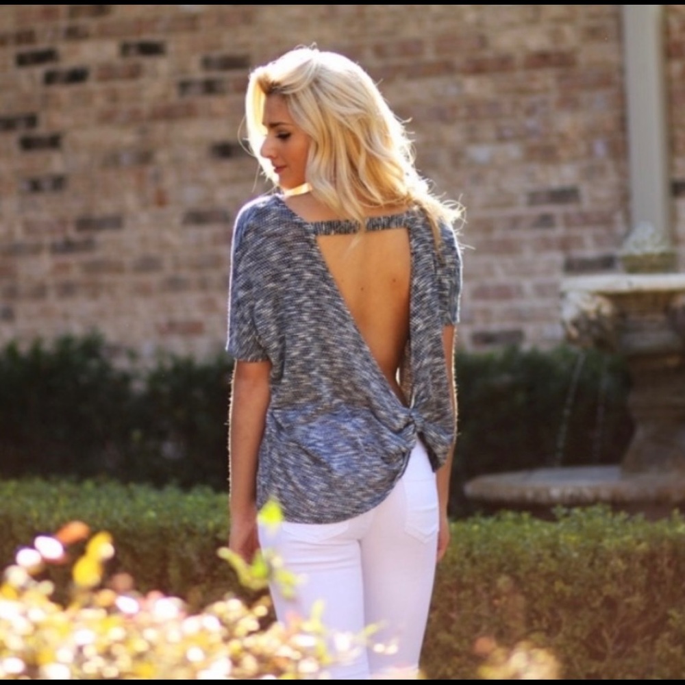 Lightweight Knit top with open back.